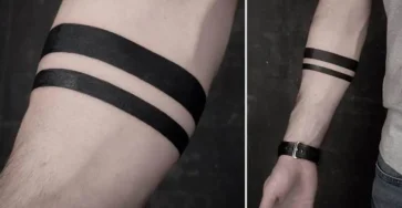 Que signifie le tatouage minimaliste a bandes noires sur lavant bras.jpg
